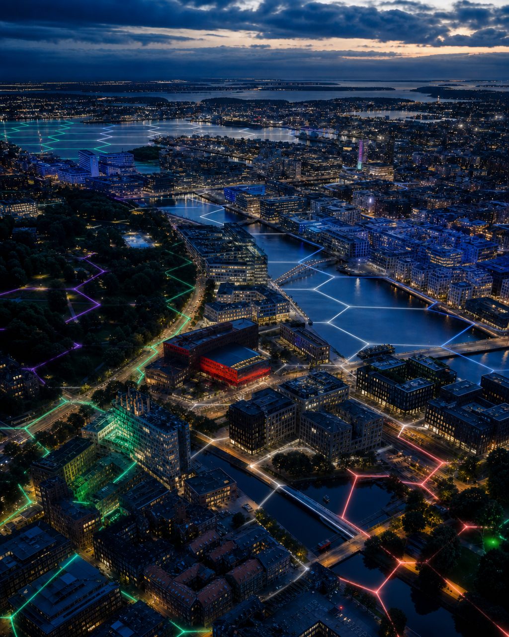 An aerial view of a city at night with faction-coloured hexagon borders traced across its districts and waterways.